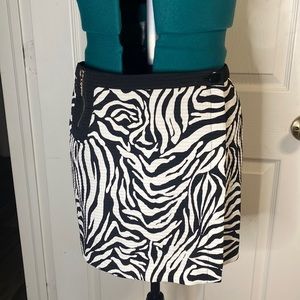Q.U.E., zebra print wrap skirt. 8